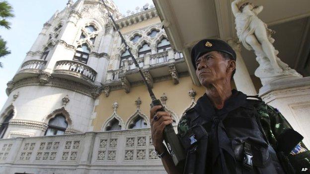 A Thai soldier outside Government House, Tuesday, May 20, 2014