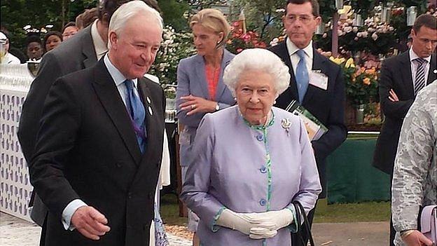 Raymond Evison showing Queen Elizabeth II the Guernsey Clematis display at RHS Chelsea 2014