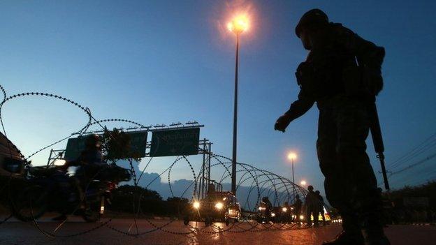 Thai soldiers man a checkpoint in Bangkok, 20 May