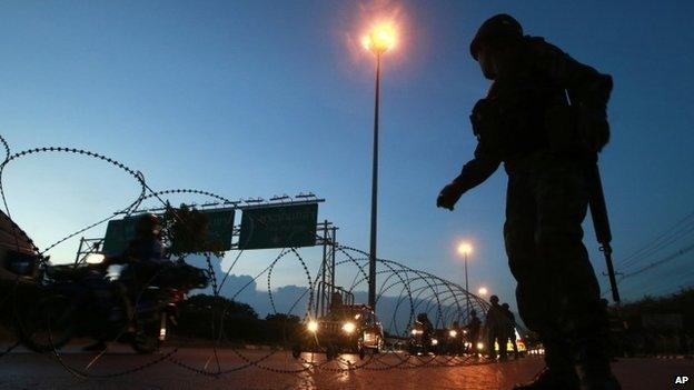 Thai soldiers man a checkpoint in Bangkok, 20 May