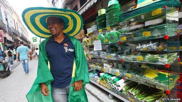 A seller of Brazilian flags and football souvenirs in Rio de Janeiro on 20 May