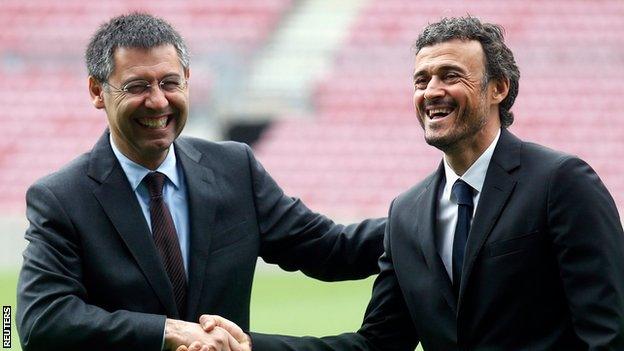 Barcelona president Josep Maria Bartomeu welcomes new coach Luis Enrique to the Nou Camp