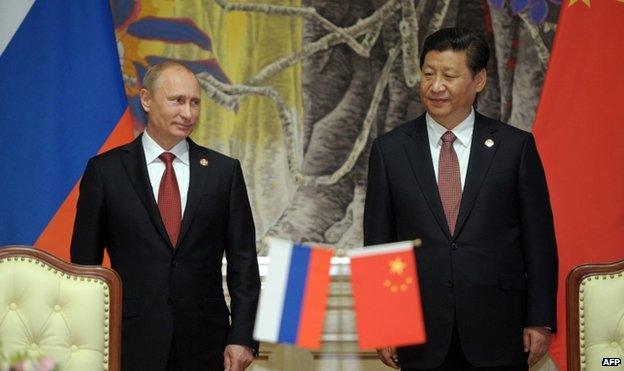 Russian President Vladimir Putin (left) with Chinese President Xi Jinping in Shanghai, China, 21 May