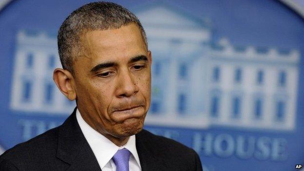 President Barack Obama pauses while speaking in the Brady Press Briefing Room of the White House in Washington 21 May 2014