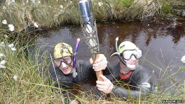 Bog snorkelers with the Baton at Peatlands Park, Dungannon