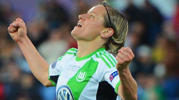 Martina Muller celebrates the winning goal for Wolfsburg