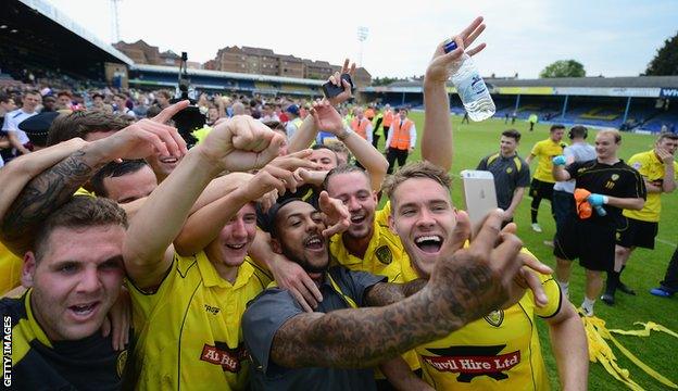 Burton Albion's players celebrate reaching Wembley with a 'selfie'