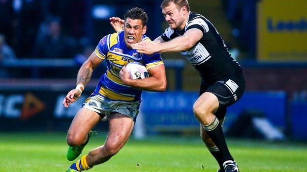 Leeds' Joel Moon is tackled by Hull FC's Liam Colbon