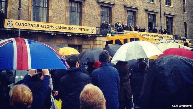 Cambridge United on balcony of the Guildhall in Cambridge Market Place