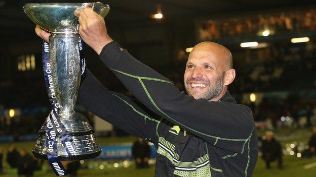 Northampton Saints' Jim Mallinder lifts the Amlin Challenge Cup