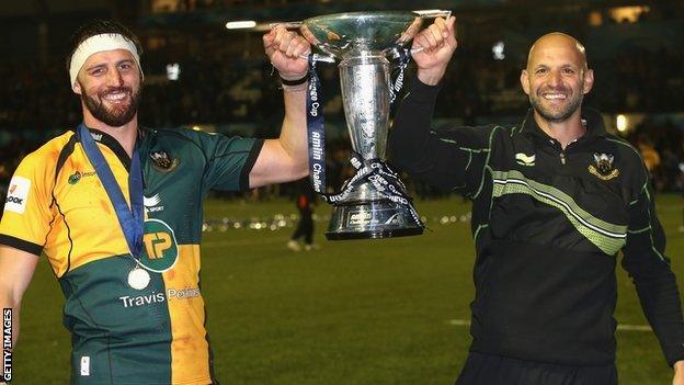 Tom Wood and Jim Mallinder lift the Amlin Challenge Cup for Northampton Saints