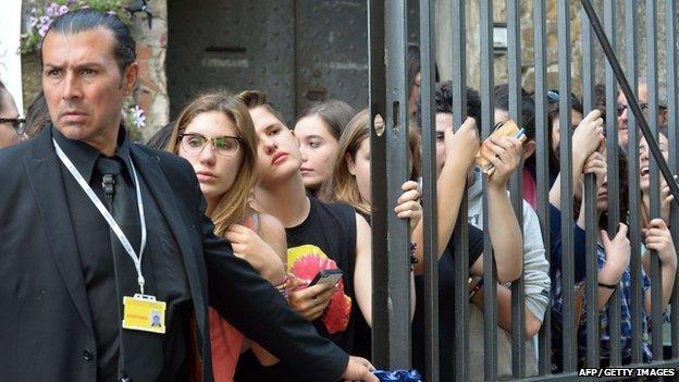 Fans outside Fort Belvedere in Florence, Italy