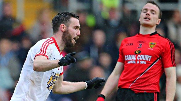 Ciaran McGinley celebrates one of his two goals at Newry