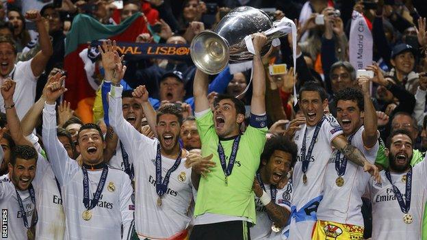 Real Madrid lift the Champions League trophy