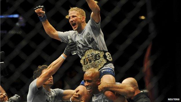 TJ Dillashaw celebrating his win