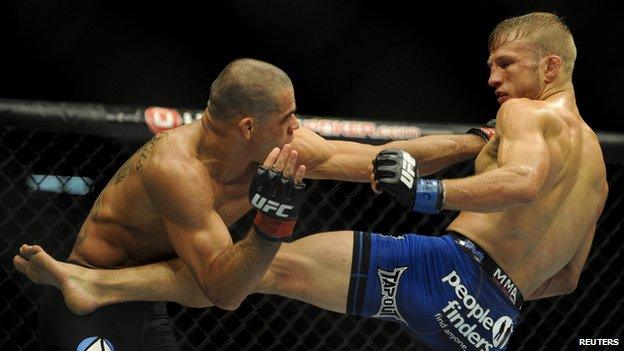 TJ Dillashaw kicking Renan Barao