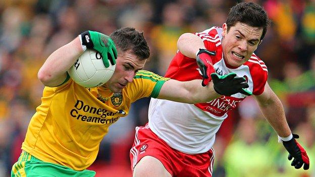 Donegal's Patrick McBrearty holds off Dermot McBride at Celtic Park