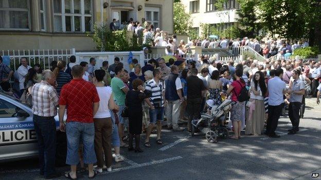 Ukrainians queuing outside their embassy in Prague ready to vote in their presidential election, 25 May 2014