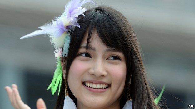 This picture taken on 8 June 2013 shows Japanese girls" pop group AKB48 member Anna Iriyama during the group's concert at the Yokohama stadium.