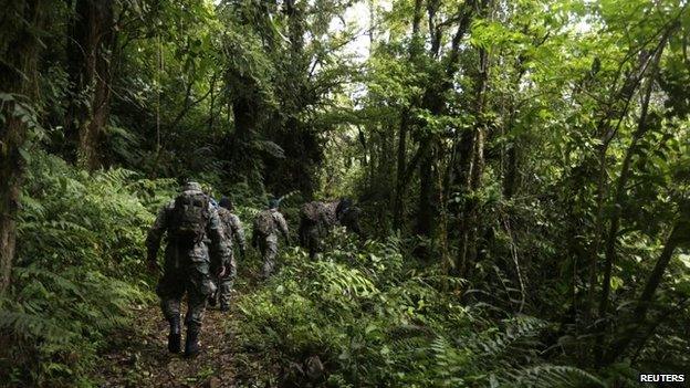 Border police search a hiking trail near Boquete on 12 April 2014