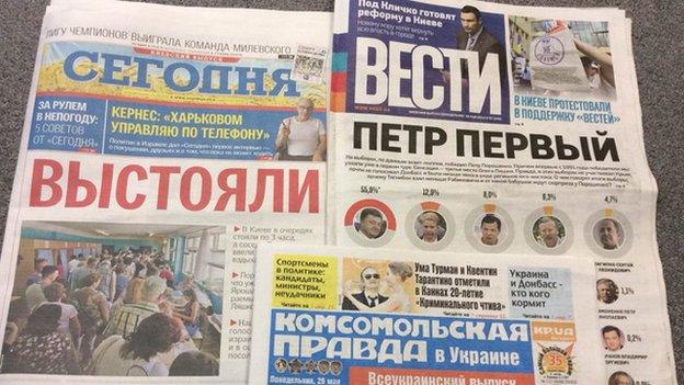 Front pages of Segodnya, Vesti and Komsomolskaya Pravda