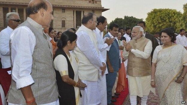 Narendra Modi, second right, greets other leaders upon arrival for his inauguration in New Delhi, India, Monday, May 26, 2014.