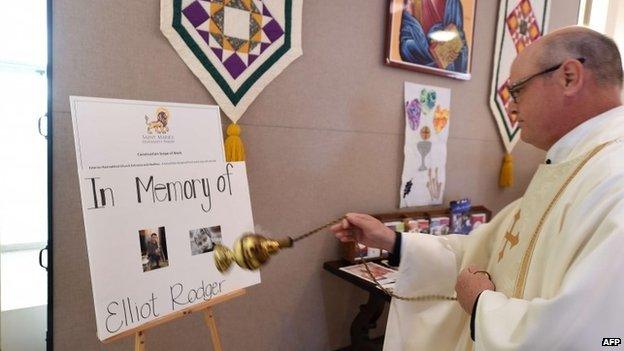 Father John Love at a memorial service