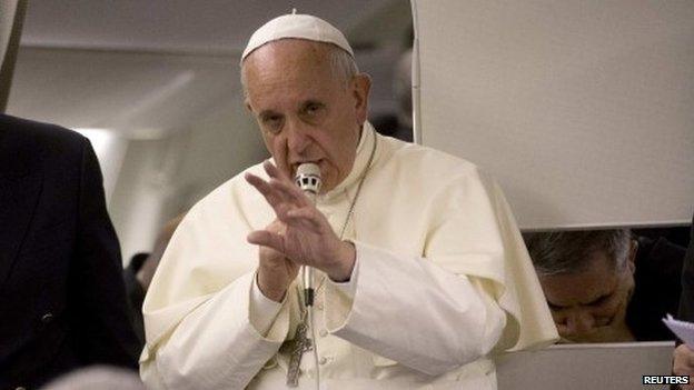 Pope Francis talks to reporters on his way back to the Vatican from Jerusalem - 26 May 2014