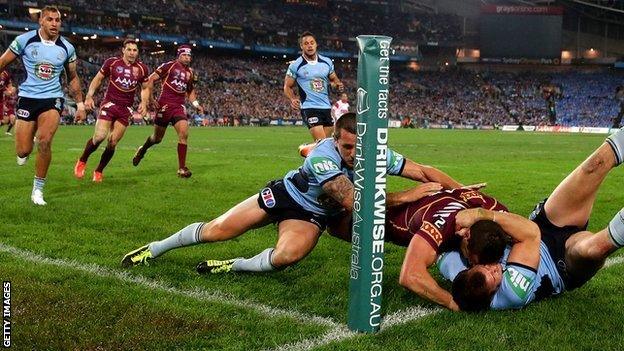 NSW bundle Darius Boyd of Queensland into touch