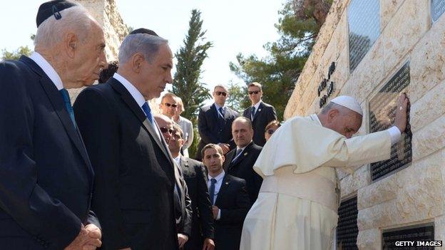 President Shimon Peres and Prime Minister Benjamin Netanyahu accompany Pope Francis as he visits a memorial commemorating Israelis killed by Palestinian militants, on Mount Herzl