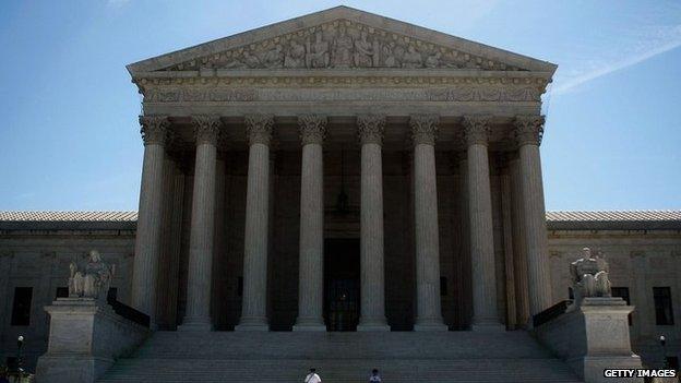 Two guards stand in front of the U.S. Supreme Court in Washington DC 12 June 2008