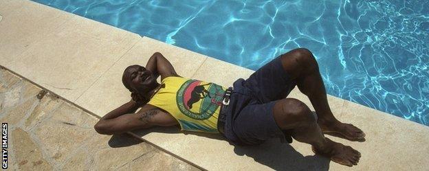 Roger Milla relaxes between matches at Italia '90