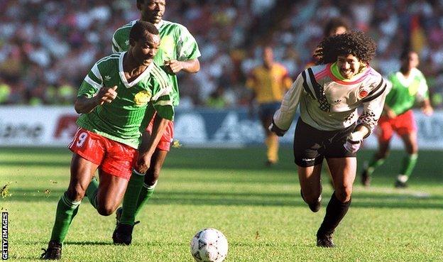 Roger Milla steals the ball from Colombia keeper Rene Higuita at Italia '90