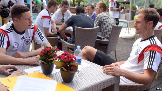 Germany's defender Benedikt Hoewedes R) and GermanyÂ´s midfielder Julian Draxler attend a media day of the German national football team at the San Andreus hotel in San Martino in Passiria, Italy, on May 25