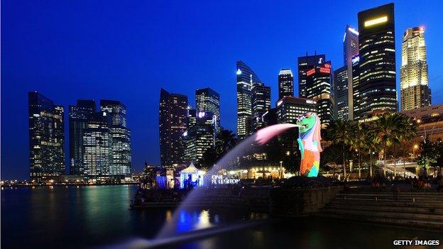 A general view of the Merlion and the central business district skyline on 28 March 2012 in Singapore.