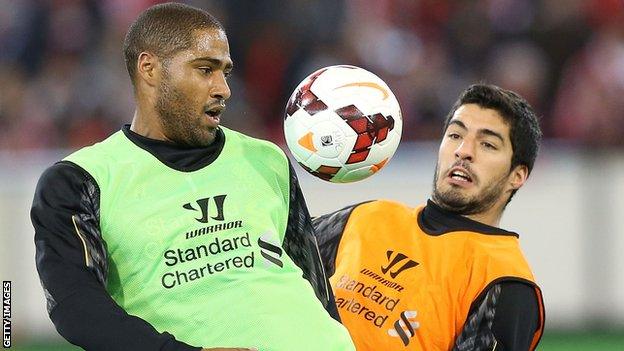 Glen Johnson (left) and Luis Suarez training while on Liverpool duty