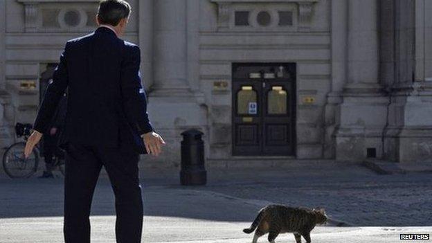 Foreign Office minister Hugh Robertson ushers away Freya ahead of a conference on Syria earlier this month