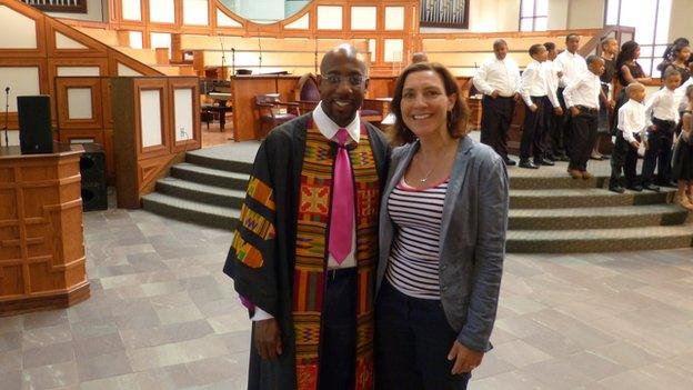 Reverend Raphael Warnock, the senior pastor at the Ebenezer Baptist Church in Atlanta, with Murphy Cobbing