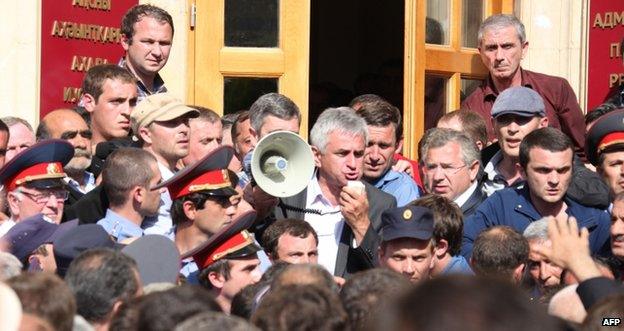 Raul Khadzhimba addresses protesters in front of the presidential office in Sukhumi, Abkhazia, 27 May