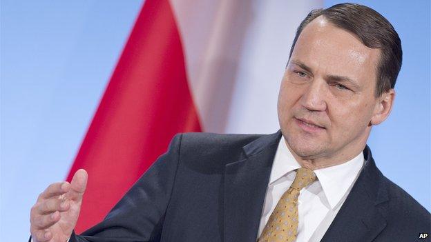 Polish Foreign Minister Radoslaw Sikorski gestures during a press conference after a meeting with his German and French counterpart - the so-called Weimar Triangle - in the city castle in Weimar, Germany, Tuesday, April 1