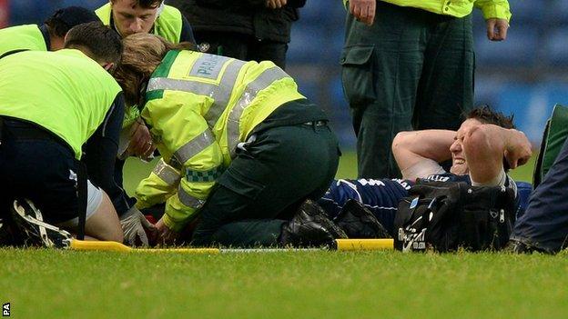 Ryan Jones of Bristol on stretcher