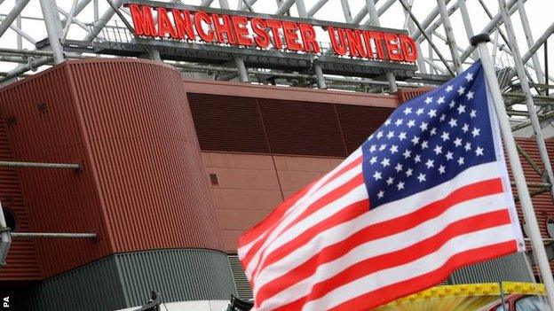 A US flag outside Old Trafford