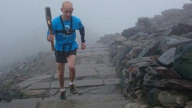 Eryri Harriers with the Queen's Baton on Snowdon