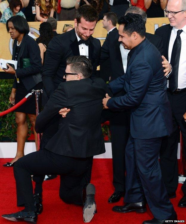 Vitalii Sediuk with Bradley Cooper at the SAG Awards