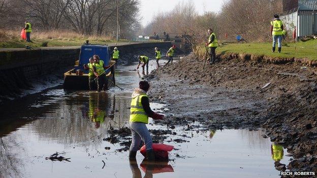 Volunteers dredging Rochdale canal