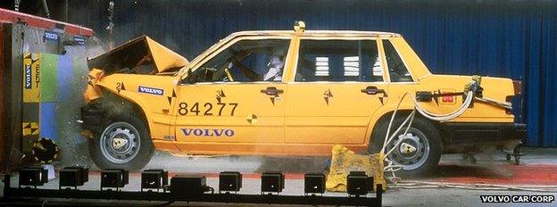 A promotional photograph showing the safety of a Volvo