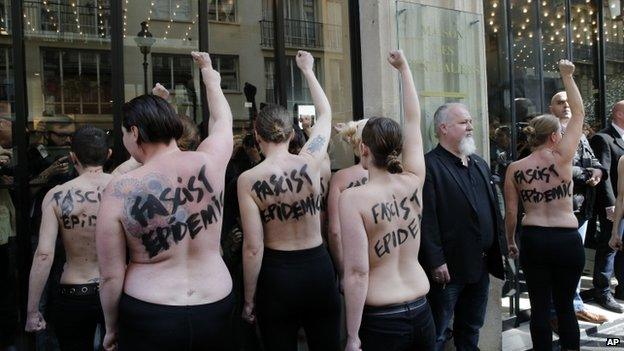 Femen activists demonstrate against the National Front in Paris, 22 April