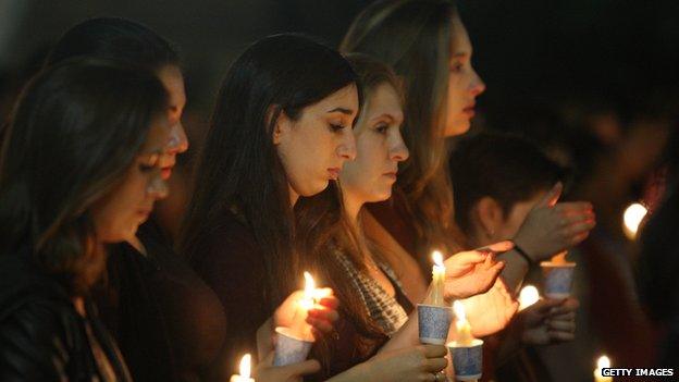 Students at a candlelight vigil for the victims of a killing rampage on May 26, 2014 in Los Angeles, California