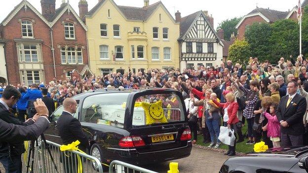 Crowd following the service