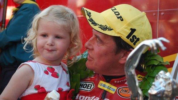 John McGuinness with his daughter Maisie